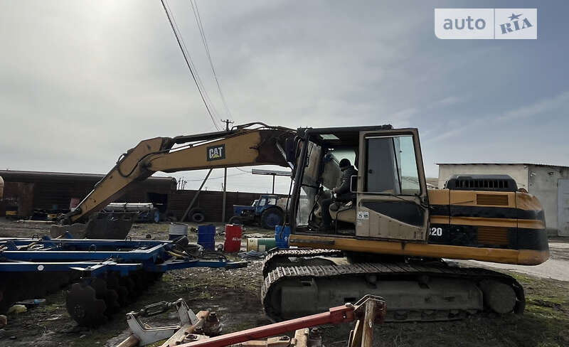 Экскаватор погрузчик Caterpillar 320 1998 в Запорожье