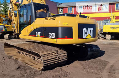 Гусеничный экскаватор Caterpillar 320 2009 в 