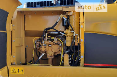 Гусеничный экскаватор Caterpillar 320 2009 в 