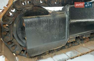 Гусеничный экскаватор Caterpillar 320 2007 в 