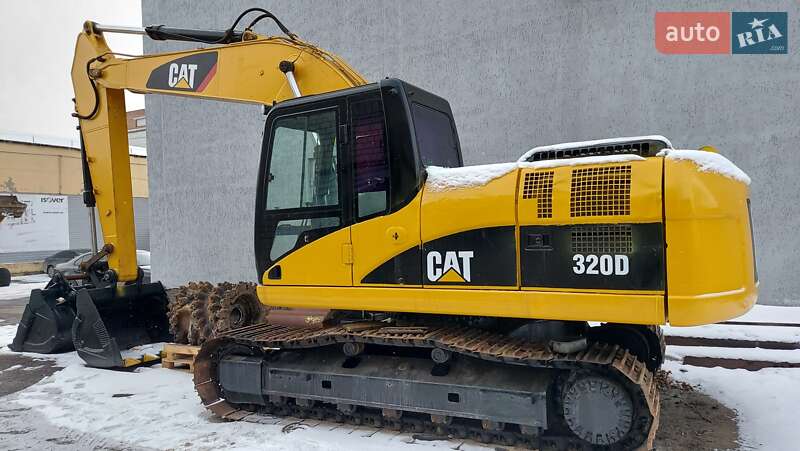Гусеничный экскаватор Caterpillar 320 2007 в 