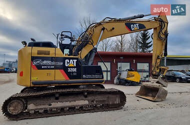Гусеничный экскаватор Caterpillar 320 2014 в 