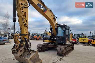 Гусеничный экскаватор Caterpillar 320 2014 в 