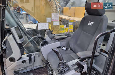 Гусеничный экскаватор Caterpillar 320 2014 в 