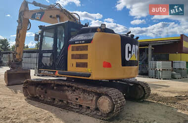 Гусеничный экскаватор Caterpillar 320 2013 в 