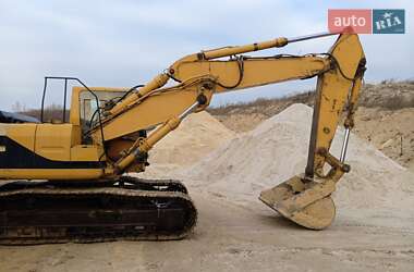 Экскаватор погрузчик Caterpillar 322 1997 в Чемеровцах