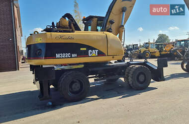 Экскаватор погрузчик Caterpillar 322 2007 в 