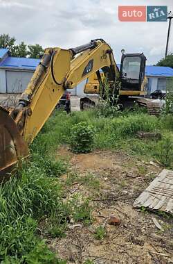 Экскаватор погрузчик Caterpillar 330 2008 в 