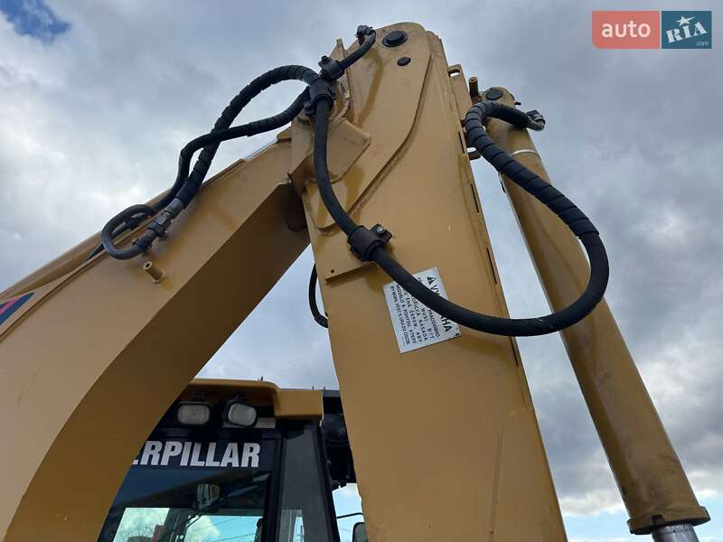 Экскаватор погрузчик Caterpillar 428 2004 в Белой Церкви