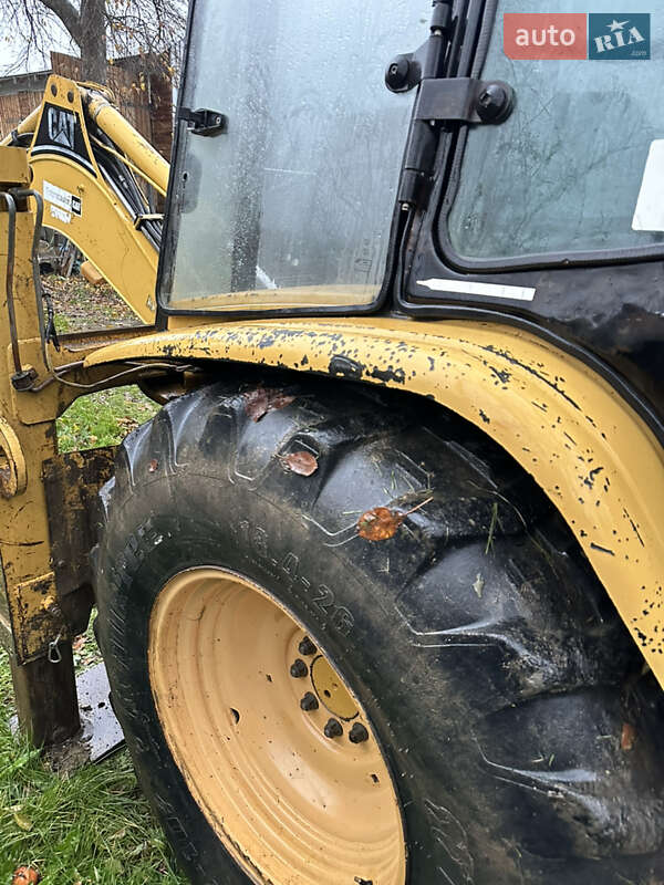 Екскаватор навантажувач Caterpillar 428 1999 в Чернівцях