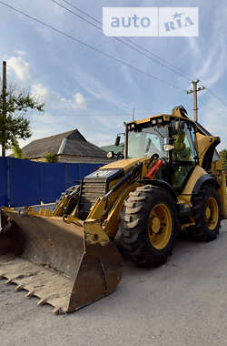 Экскаватор погрузчик Caterpillar 444 2014 в 