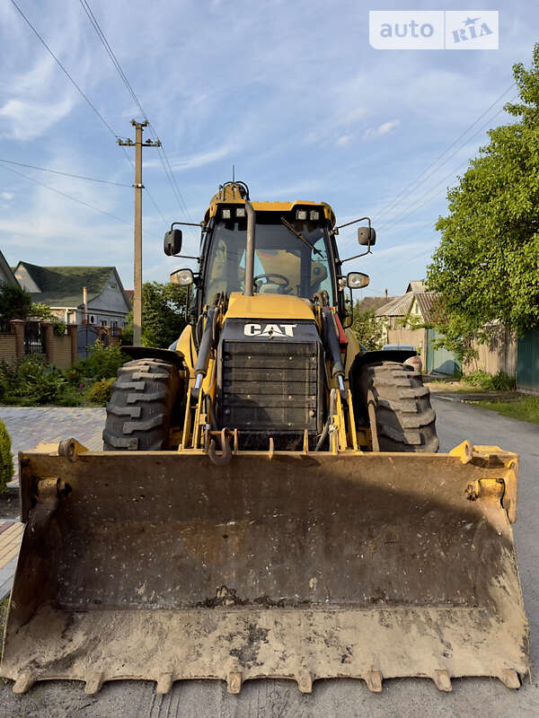 Экскаватор погрузчик Caterpillar 444 2014 в Павлограде