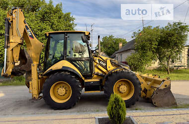 Экскаватор погрузчик Caterpillar 444 2014 в 