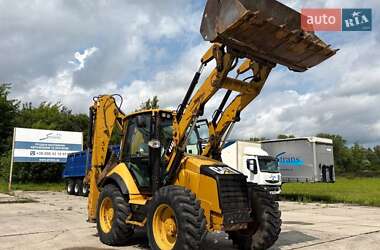 Экскаватор погрузчик Caterpillar 444 2014 в 