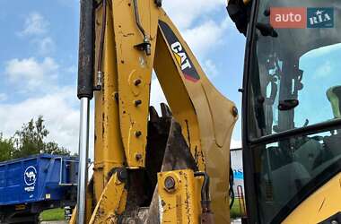 Экскаватор погрузчик Caterpillar 444 2014 в 