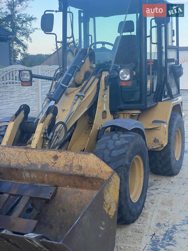 Фронтальный погрузчик Caterpillar 906 2005 в Львове