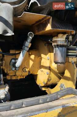 Экскаватор погрузчик Caterpillar M312 2002 в Житомире