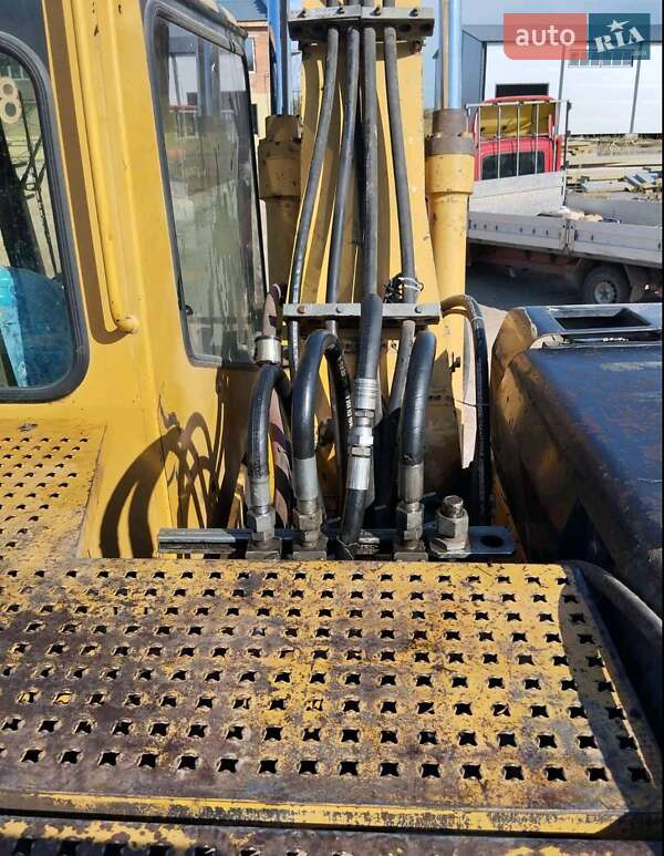 Екскаватор навантажувач Caterpillar M312 2002 в Житомирі