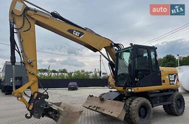 Колісний екскаватор Caterpillar M313 2012 в Долині