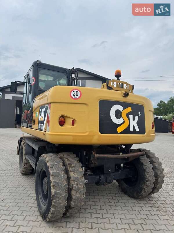 Колесный экскаватор Caterpillar M313 2012 в Долине