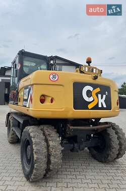Колесный экскаватор Caterpillar M313 2012 в 