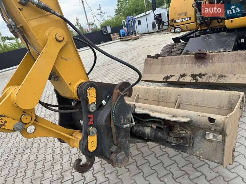 Колесный экскаватор Caterpillar M313 2012 в Долине