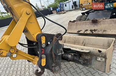 Колесный экскаватор Caterpillar M313 2012 в 