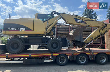 Колесный экскаватор Caterpillar M315 2004 в Косове