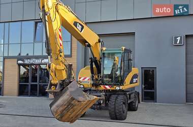 Колесный экскаватор Caterpillar M315 2009 в 