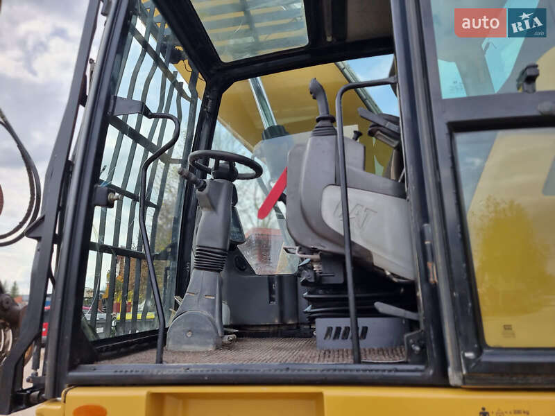 Экскаватор погрузчик Caterpillar MH 3022 2018 в Одессе