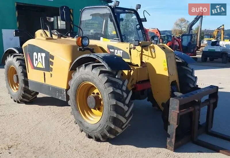 Телескопічні навантажувачі Caterpillar TH 2009 в 