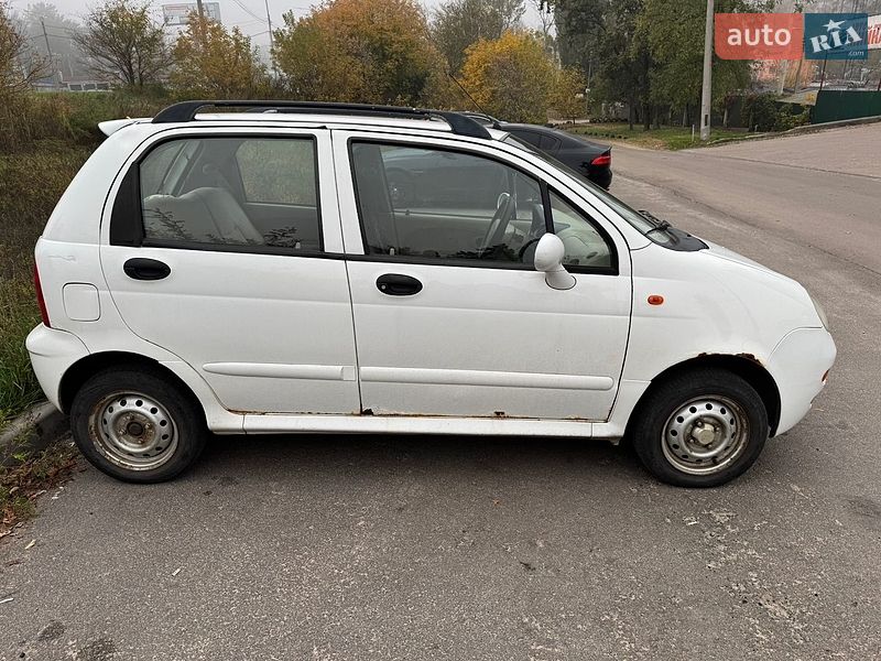 2011 Chery QQ, VIN LVVDB22AXBD362075:plate — photo 1 (autoria)