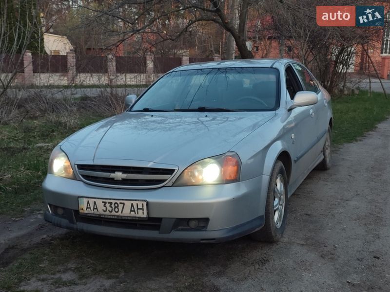 2005 Chevrolet Evanda, VIN KL1LA69ZE5B163154:plate — фото 1 (autoria)
