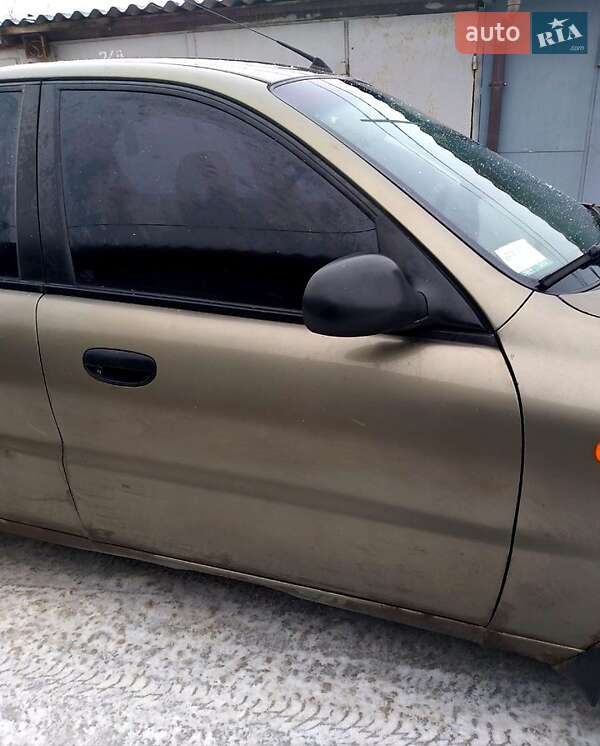 2006 Daewoo Lanos, VIN SUPTF69YD6W299513:plate — фото 1 (autoria)