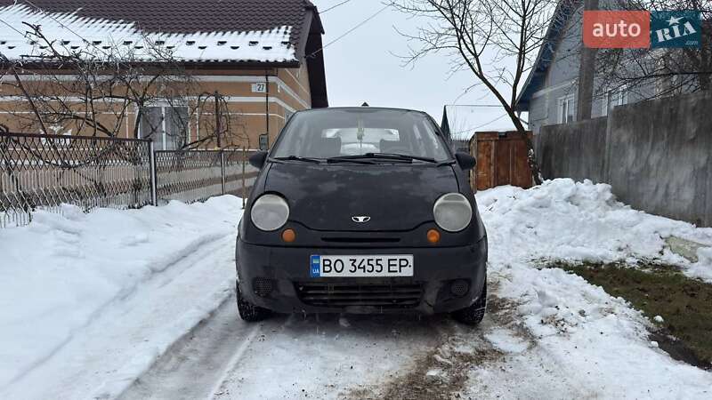 2011 Daewoo Matiz, VIN XWB4A11CDBA582358:plate — photo 1 (autoria)
