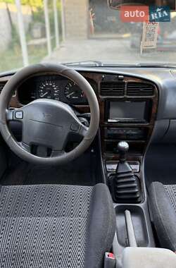 Лифтбек Daihatsu Applause 1999 в 