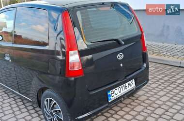 Хэтчбек Daihatsu Cuore 2004 в 