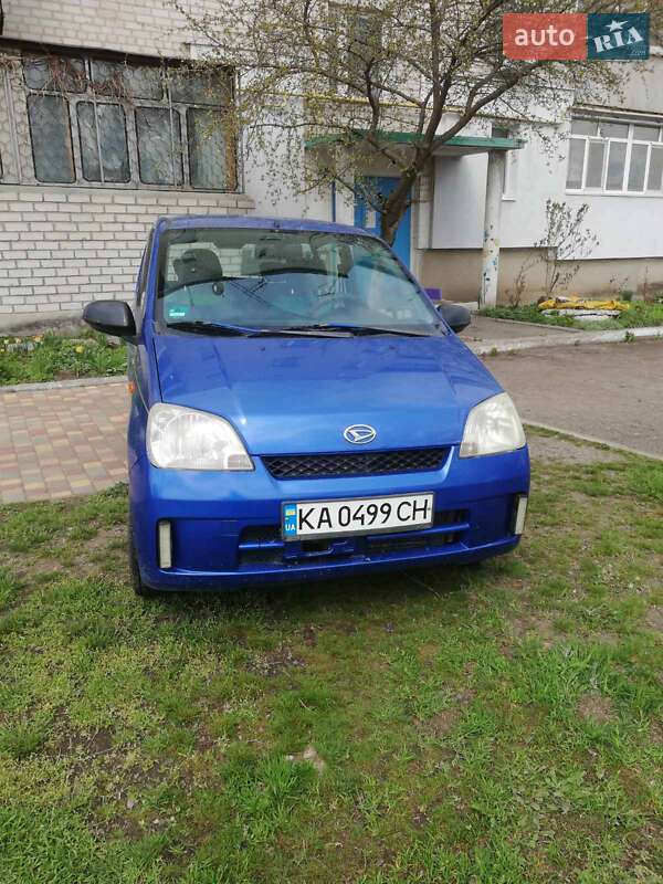 Хэтчбек Daihatsu Cuore 2003 в 