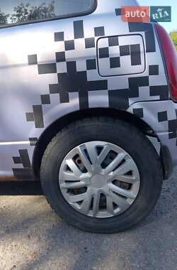 Хэтчбек Daihatsu Cuore 2003 в 