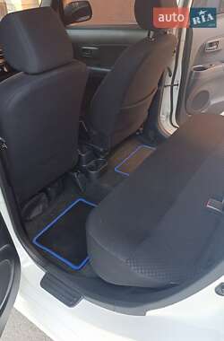 Хетчбек Daihatsu Materia 2009 в 