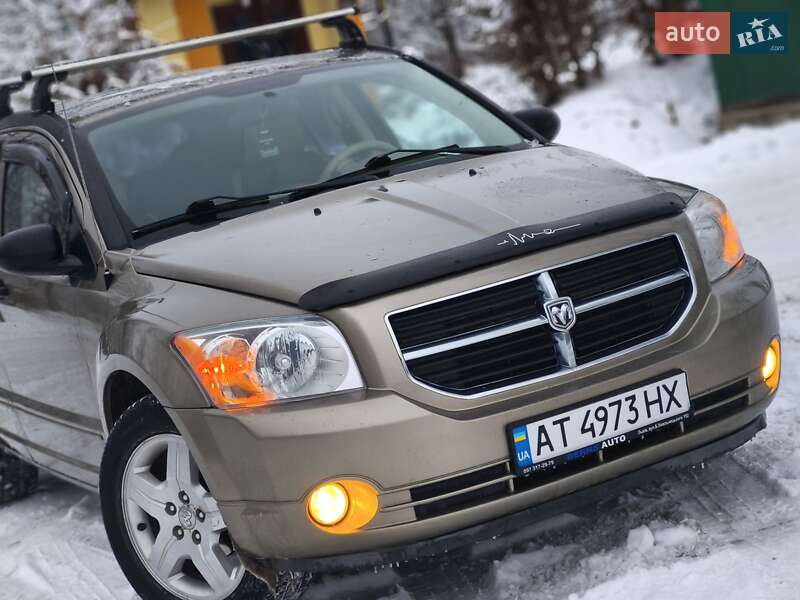 2007 Dodge Caliber, VIN 1B3HB48B37D340449:plate — фото 1 (autoria)