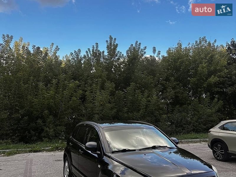 2009 Dodge Caliber, VIN 1B3HBN8C29D258570:plate — фото 1 (autoria)