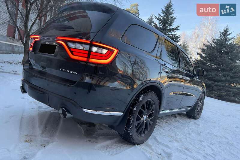 2015 Dodge Durango, VIN 1C4SDJET6FC888803:plate — фото 1 (autoria)