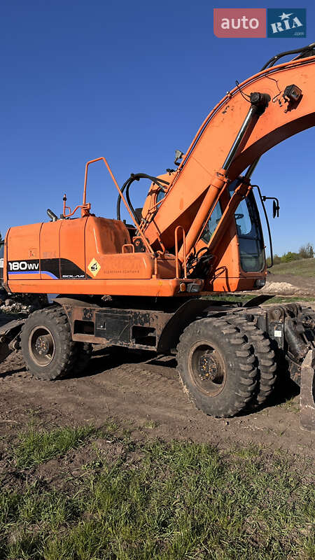 Экскаватор погрузчик Doosan Solar 2010 в 