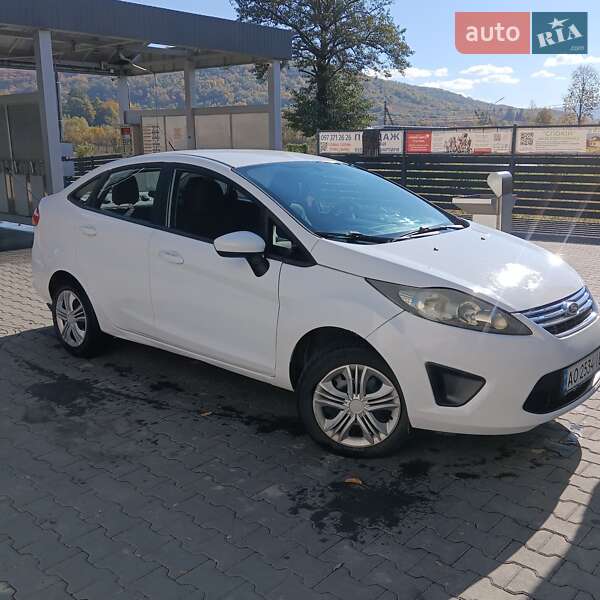 2012 Ford Fiesta, VIN 3FADP4BJ7DM157477:plate — фото 1 (autoria)