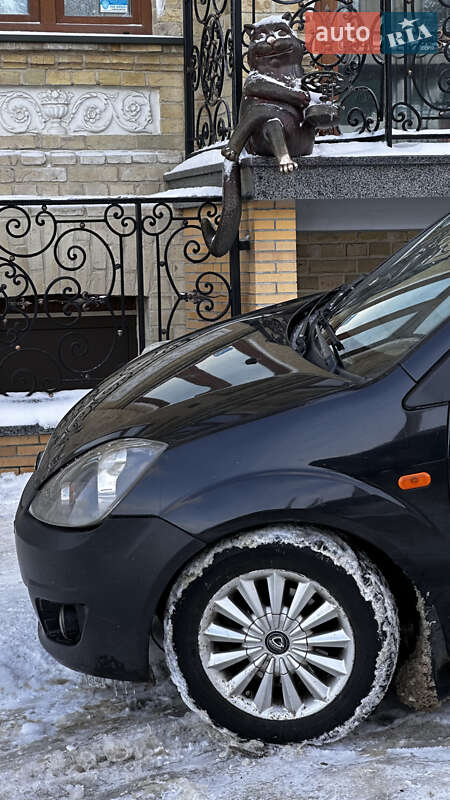 2008 Ford Fiesta, VIN WF0HXXWPJH8L70053:plate — фото 1 (autoria)