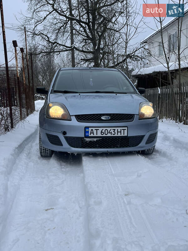 2006 Ford Fiesta, VIN WF0HXXWPJH6A08569:plate — фото 1 (autoria)