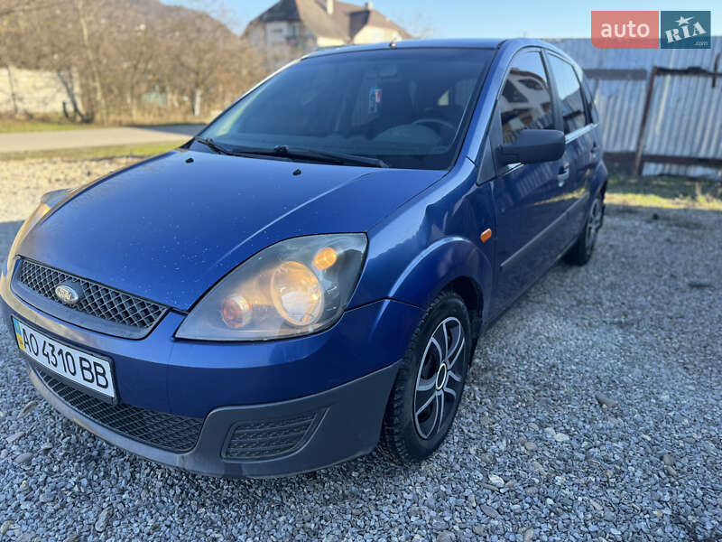 2006 Ford Fiesta, VIN WF0HXXWPJH6A02807:plate — фото 1 (autoria)