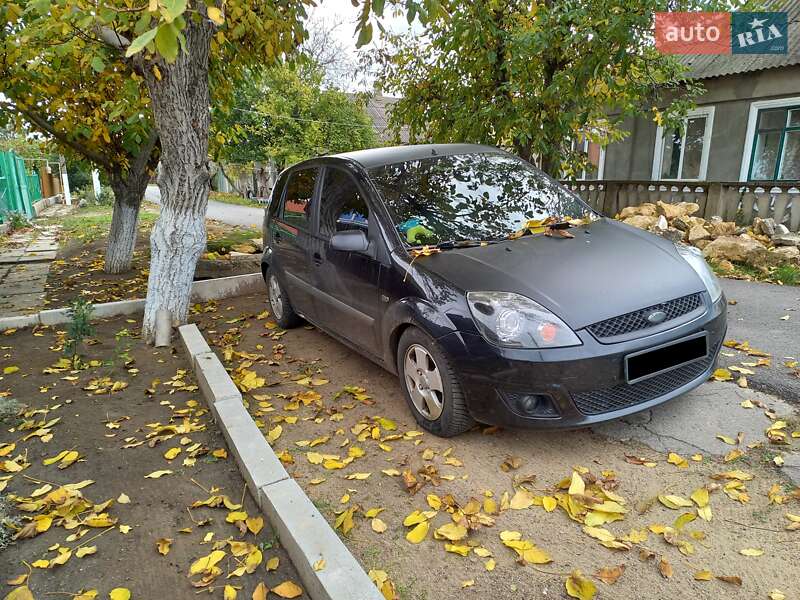 2008 Ford Fiesta, VIN WF0HXXWPJH8L71522:plate — фото 1 (autoria)