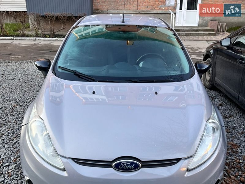 2012 Ford Fiesta, VIN WF0JXXGAJJCK01074:plate — фото 1 (autoria)